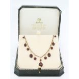 9ct Gold Necklace with 11 drop pendants of Cabochon Garnets weight 8.3g