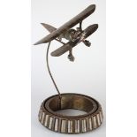 Unusual RAF trophy, circa WWI era, made from aircraft parts, depicting a biplane, base consists of