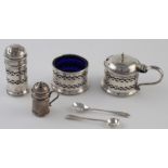 Three piece silver cruet, pepper, mustard & salt and two matching spoons all hallmarked for