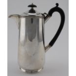 Silver hot water jug with wooden handle, hallmarked S&S, Sheffield, 1937. Weight 15oz.