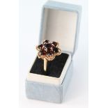 9ct Gold floral set Garnet Ring size N, weight 4.1g