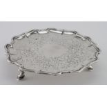 Silver card tray, raised on three feet, hallmarked 'RS, London 1846', feet need straightening,