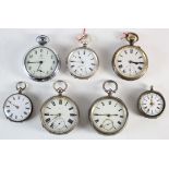 Seven open face pocket watches, various sizes, includes four silver examples.