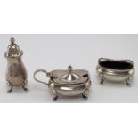 Silver cruet set comprising mustard, salt and pepper pots plus two blue glass liners, silver