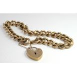 9ct hallmarked bracelet with padlock and safety chain, total weight approx 28.5g