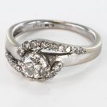 18ct white gold Diamond crossover ring, the single stone with diamond set shoulders, approx 1.0ct