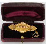 9ct Gold Ruby and Diamond Bar Brooch with safety chain and original box weight 3.5g