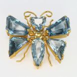 Yellow metal (tests 14ct) Aquamarine set Butterfly Brooch weight 24.g