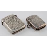 Two early silver engraved vesta cases, hallmarked for Birmingham 1899 & 1904. Makers - W.O. & J&C.