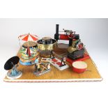 Mamod & Wilesco. A display board containing seven items including two mamod stationary engines, a