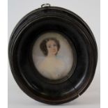 Portrait miniature. Oil on ivory (?), circa 19th century, depicting a portrait of a young lady,