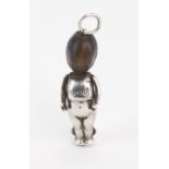 White metal and wooden headed Fumsup articulated good luck figure, marked on back reg No 636612.