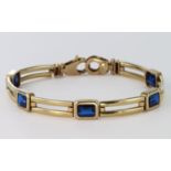 Yellow metal Bracelet (tests 14ct) set with synthetic Sapphires weight 14.3 grams