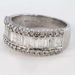 18ct Half Hoop diamond ring, centred with a row of baguette cut diamonds within a border of circular