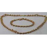 18ct Gold Matching fancy Necklace and Bracelet set weight 35.7g