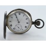 Silver half hunter pocket watch, the white dial with bold roman numerals and subsidiary second