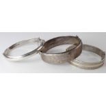 Three silver bangles, various silver marks. Total weight 41.5g