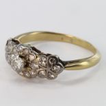 Yellow Metal (tests 18ct) Diamond set Ring (1 stone missing) size M weight 2.9 grams