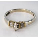 White metal (tests 14ct) Ring set with marquise and baguette Diamonds size M weight 2.0g
