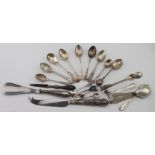 Mixed lot of 23 silver & part silver items mostly flatware, includes a silver tennis spoon and three