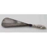 Silver topped Punch shoe horn, top marked with continental marks which includes "830".
