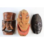 Three carved masks