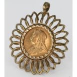 1899 Sovereign in an ornate 9ct Gold Sunburst mount weight 14.9g