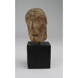 Terracotta? [seems heavy], bust of female, with long flowing hair, held with a single fillet head-