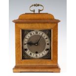 Garrard & Co. oak mantle clock with brass handle, retirement plaque inside door at front, lock to