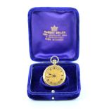 Boxed Ladies 9ct gold open face pocket watch, the gilt engine turned and foliage engraved dial