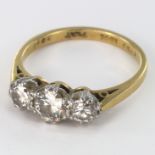 18ct / Platinum three stone diamond ring size N, approx weight 3.3g
