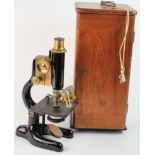 Brass and black lacqued Microscope, circa early 20th century, contained in a Broadhurst Clarkson