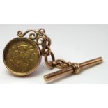 Hallmarked 9ct "T" bar with a 1906 Half Sovereign (in glass mount) attached, total weight 14.7g)