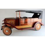 Large oak model of a vintage early 20th century style car with leather roof and interior, circa