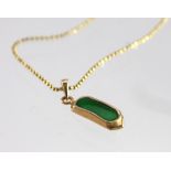 18ct Gold Jade Pendant on a 18 inch fine chain weight 2.8g