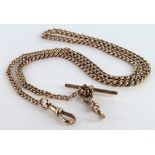Hallmarked 9ct Gold pocket watch chain with "T" Bar, length approx. 60.5cm and weighing 45g