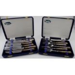 Two boxed sets of silver handled tea knives and forks - great condition. Handles hallmarked with