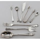 Mixed lot of silver cutlery includes three forks, three spoons, butter knife and tongs - various