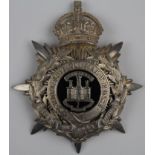 1st. Volunteer Battn. Helmet plate/badge. White metal with silver centre & scrolls - has a George