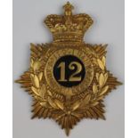 12th Foot (East Suffolk) Regt. Helmet plate/badge, has a Victorian crown. a/f