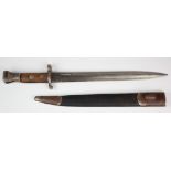 British Boer War Bayonet dated '5 '95'. With leather and metal scabbard. Blade tip missing