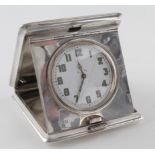Large silver cased folding 8 day travel clock, hallmarked W.N Ltd, Birmingham 1933' (William Neale &