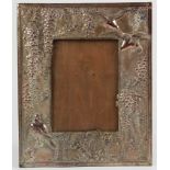 Large silver plated picture frame, ornately decorated with birds & foliage, 33.4cm x 27.4cm approx.