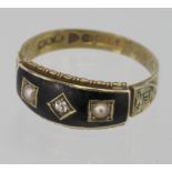 Black enamelled 15ct (hallmarked Chester 1901) memorial ring, set with a small central diamond and