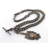 Hallmarked silver "T" bar pocket watch chain with sporting medal attached, total weight approx 97g