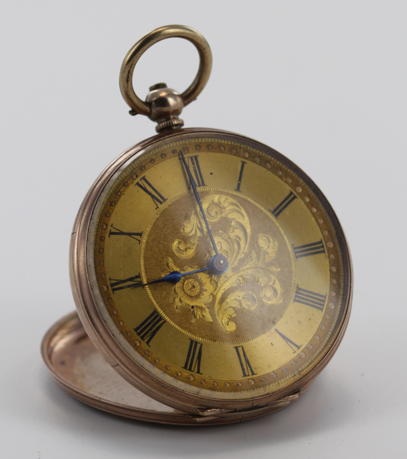 Mid size 9ct cased fob/pocket watch, the gilt dial with black roman numerals with a central floral