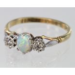 18ct Gold and Platinum Ring set with Opal and Diamonds size N weight 2.2g