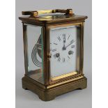 Goliath brass five glass chiming carriage clock, circa 19th century, white enamel dial with Roman