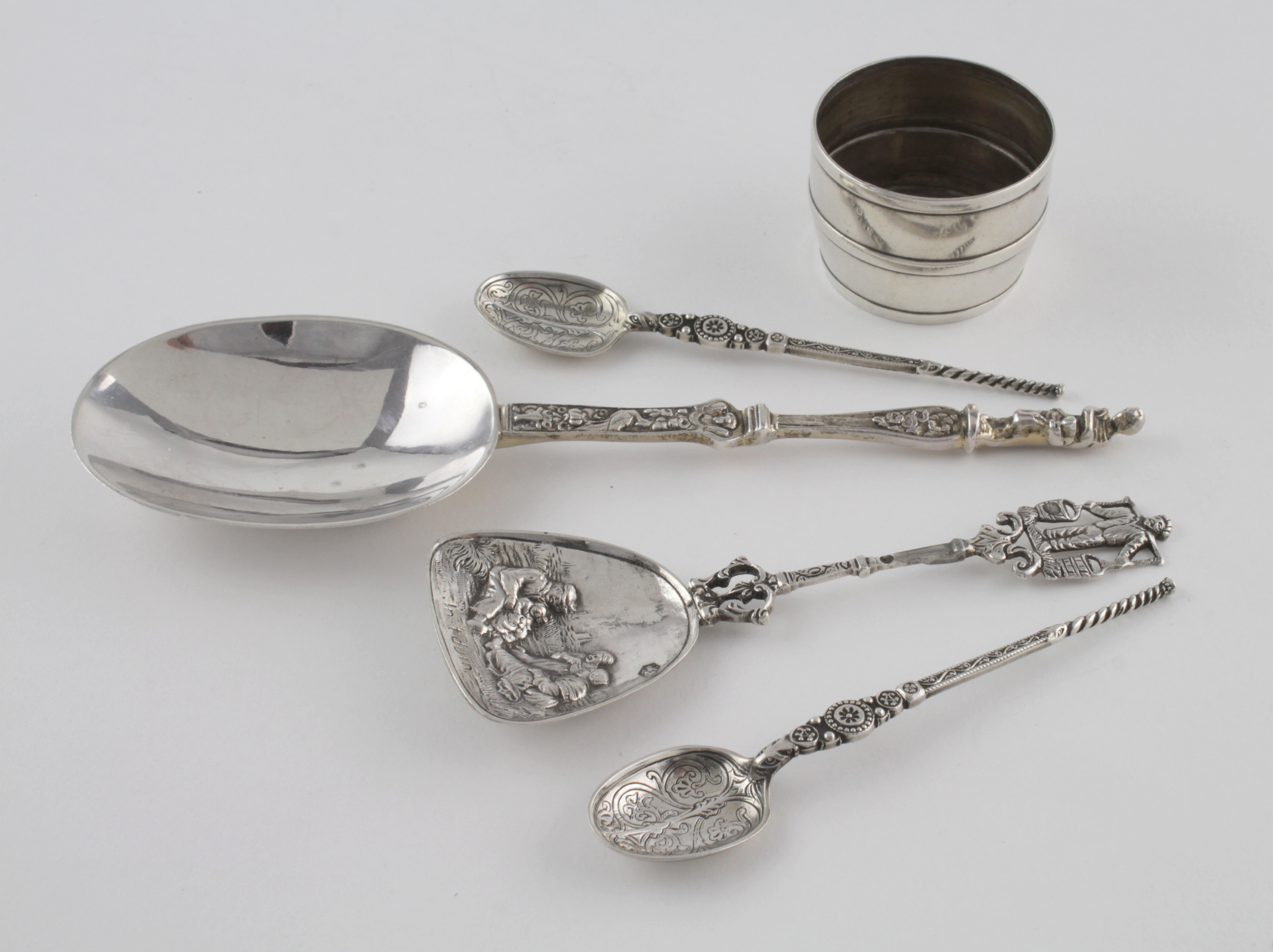 Large silver apostle spoon, hallmarked 'London 1906', length 19cm approx., together with a Dutch
