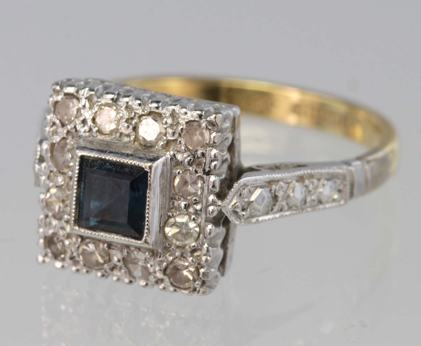 18ct White Gold Square Ring set with central square Sapphire surrounded by Diamonds size M weight